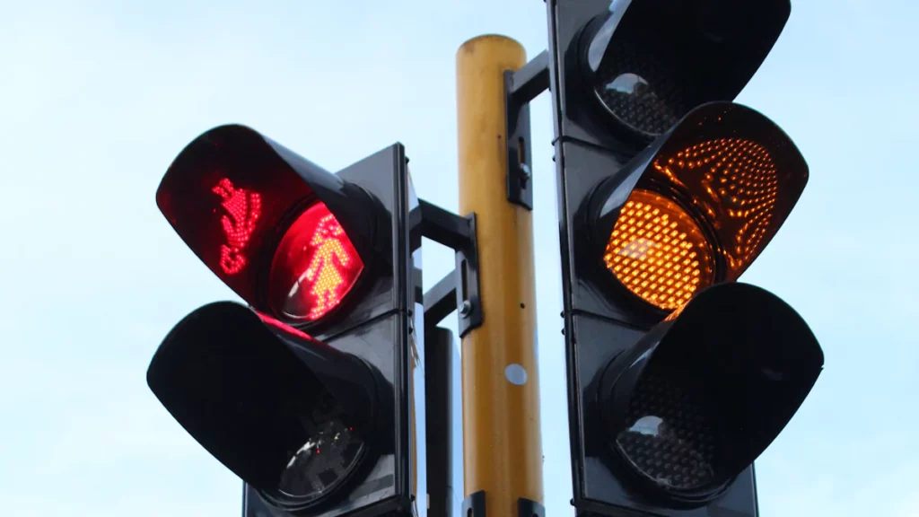 Do Flashing Headlights Affect Temporary Traffic Signals?